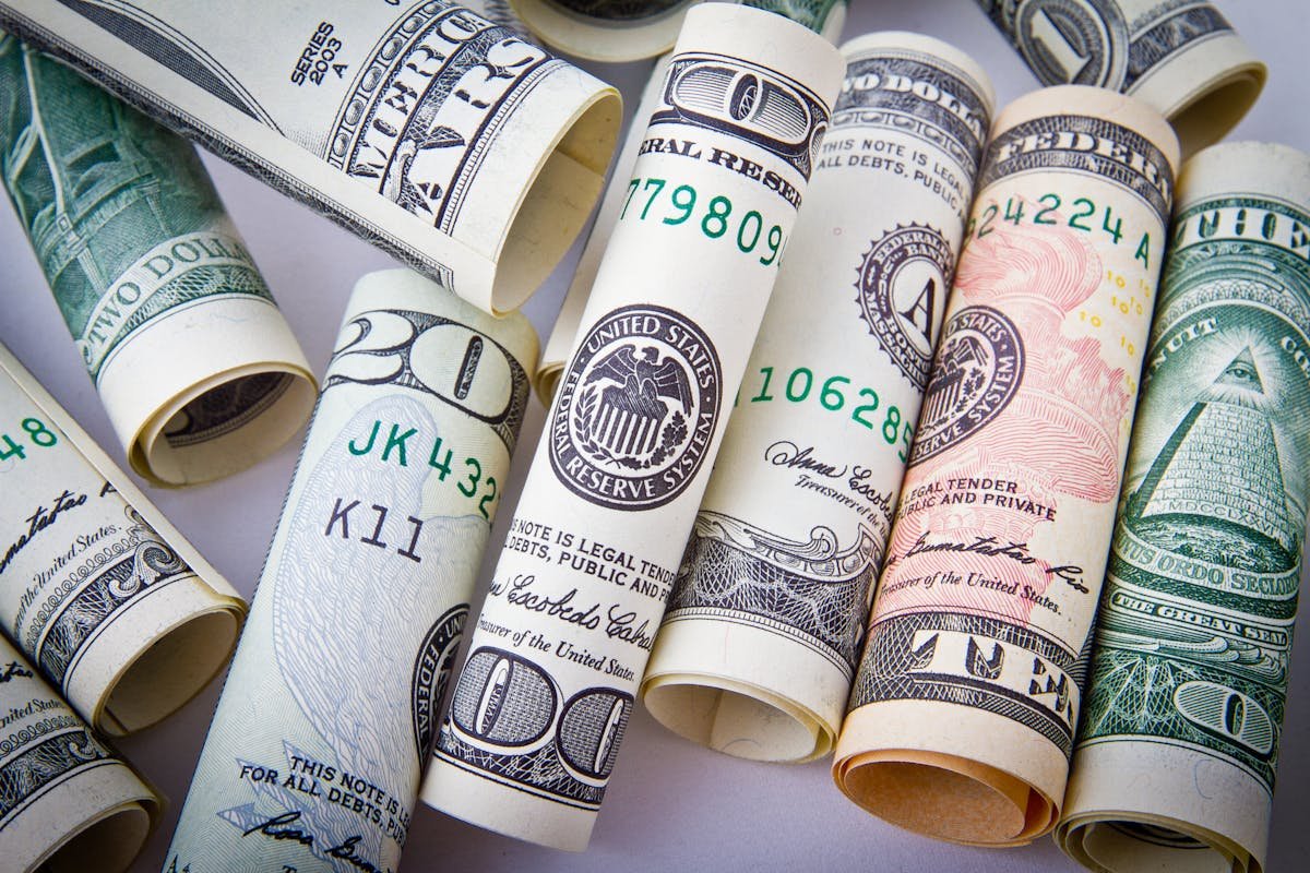 Calculator and money for adjusting comp values and pricing differences
